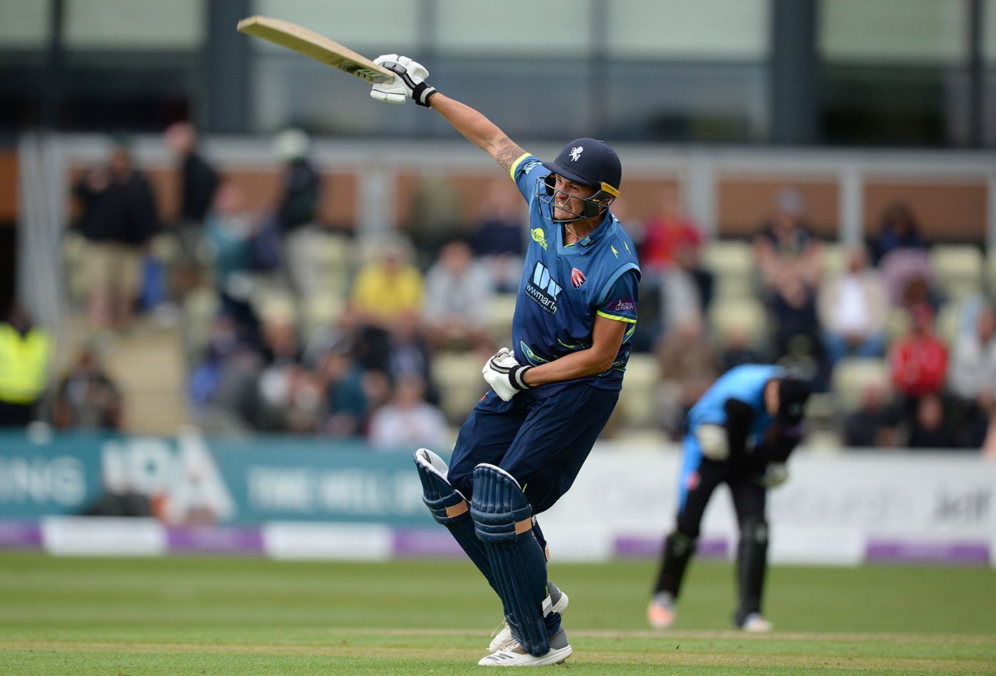 Harry Podmore celebrates his winning boundary