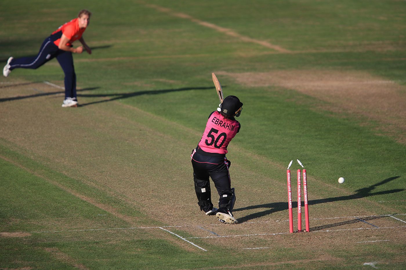 Katherine Brunt bowls Kate Ebrahim for a duck