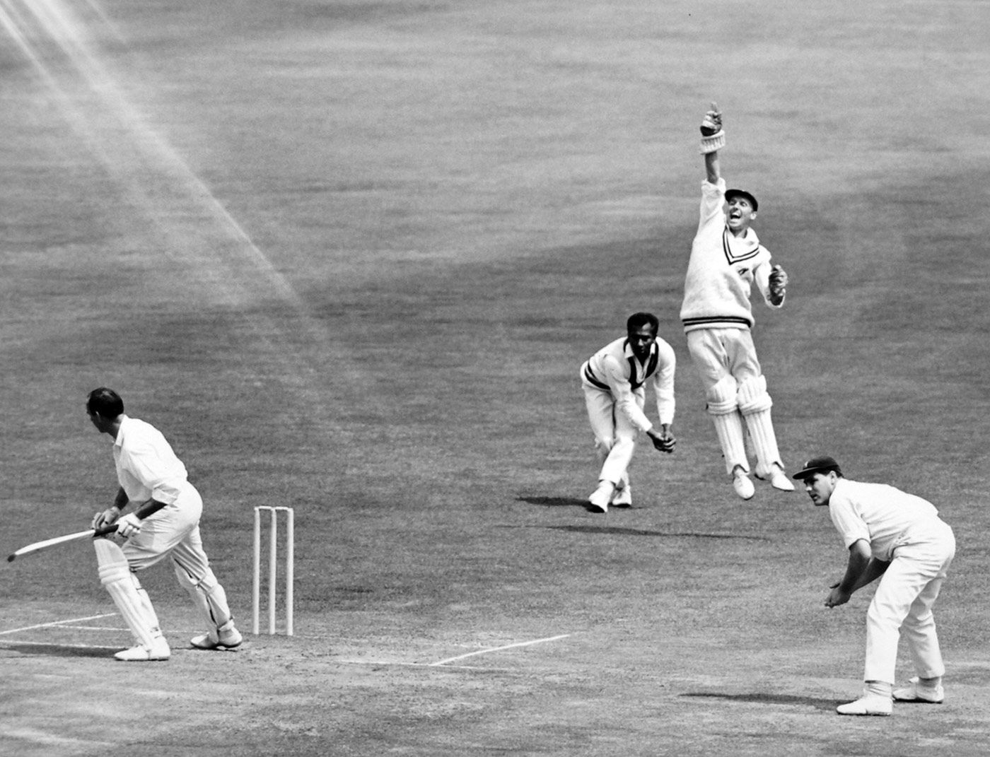 Alan Smith appeals for an lbw against Eric Russell