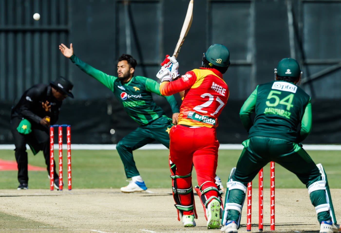 Mohammad Nawaz attempts to stop a Solomon Mire shot
