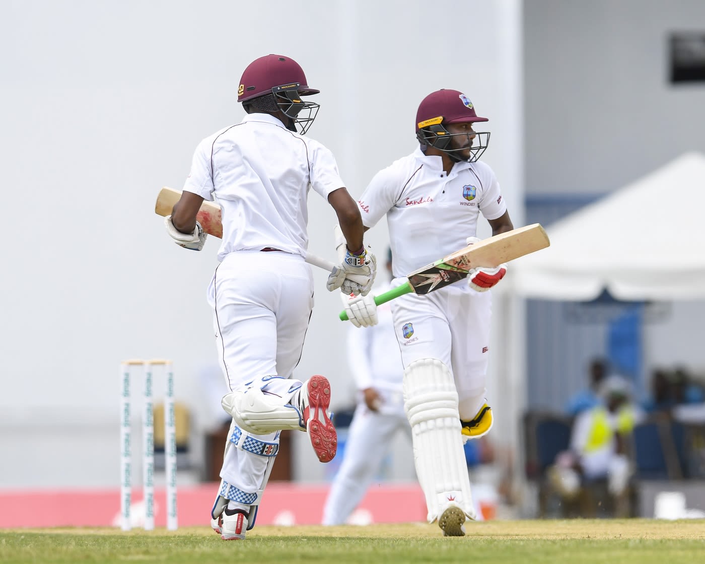 Kraigg Brathwaite and Devendra Bishoo run between the wickets