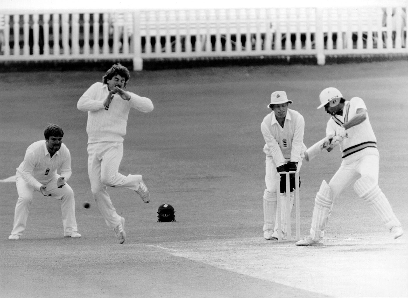 Allan Lamb takes evasive action as Kapil Dev cuts