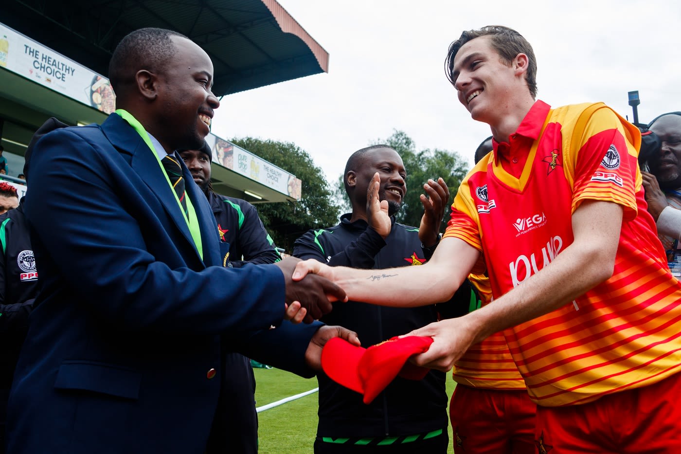 Liam Roche receives his maiden ODI cap from Prosper Utseya