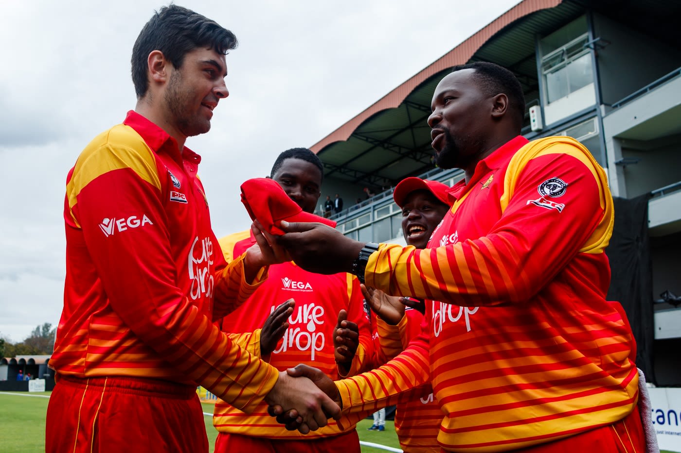 Ryan Murray receives his maiden ODI cap from Hamilton Masakadza