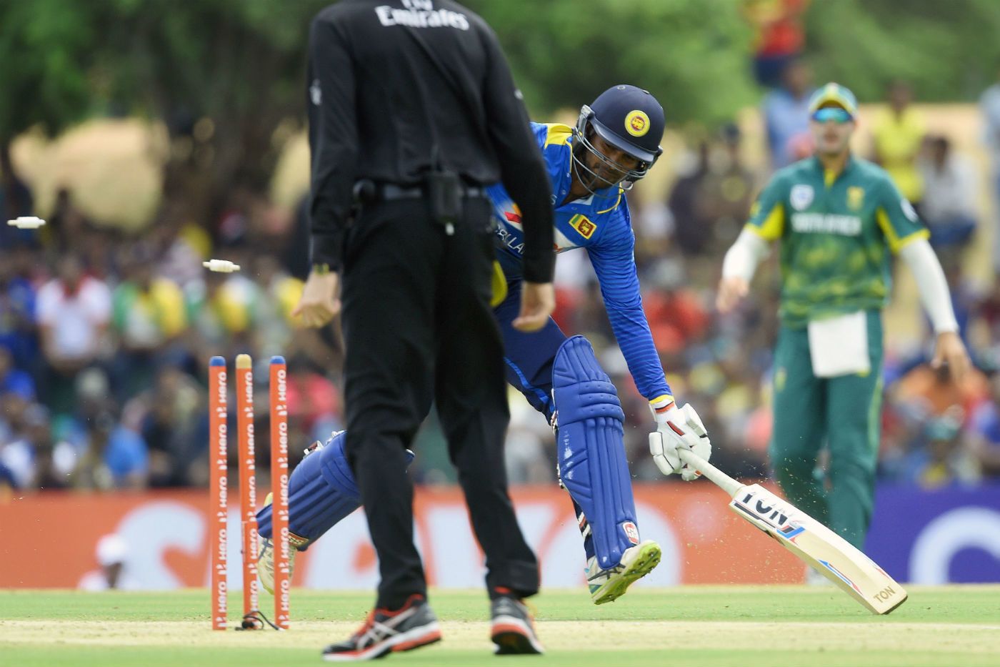 Upul Tharanga is run out at the non-striker's end