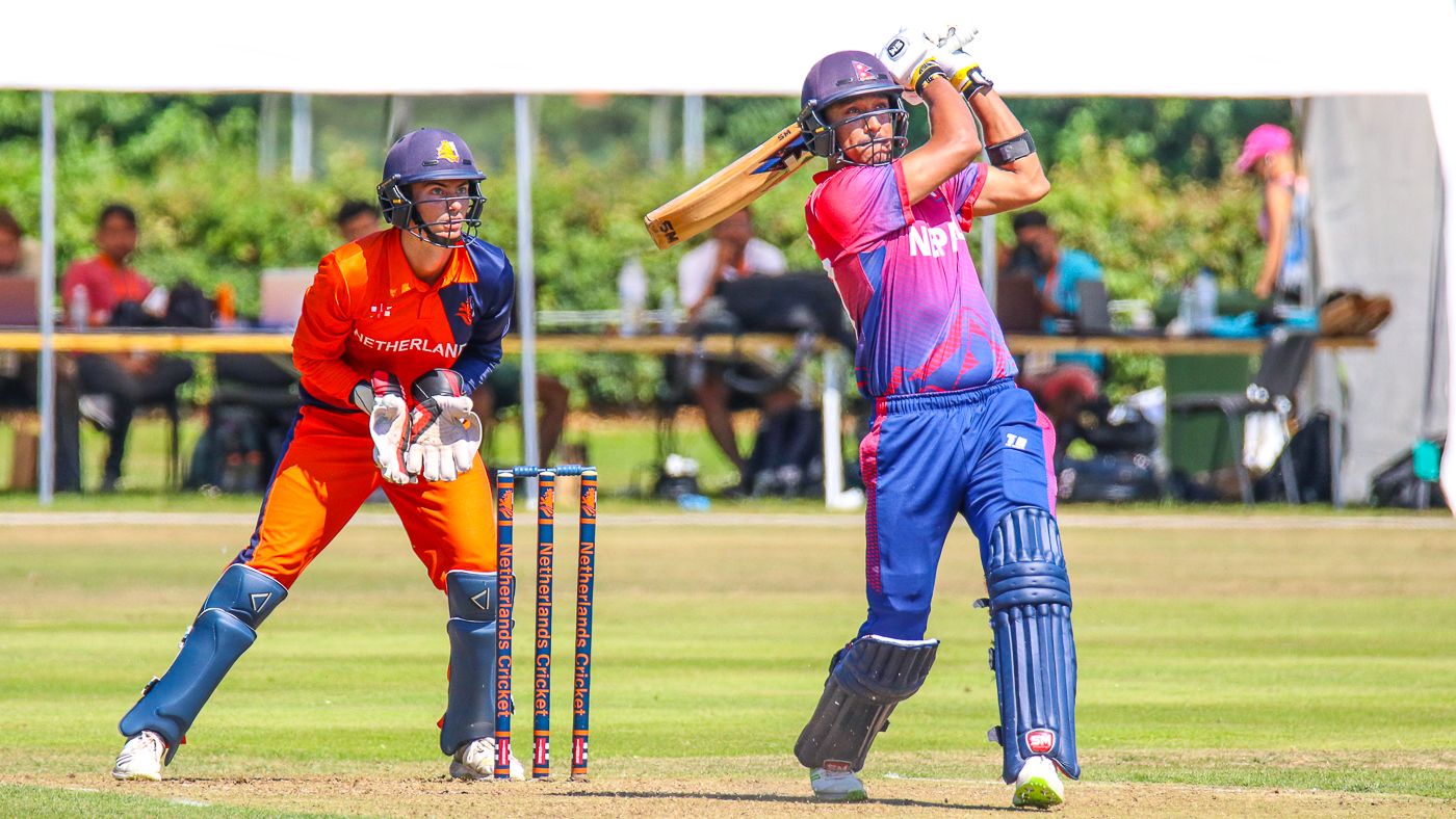 Paras Khadka drives Pieter Seelaar over long-on for six during his maiden ODI fifty