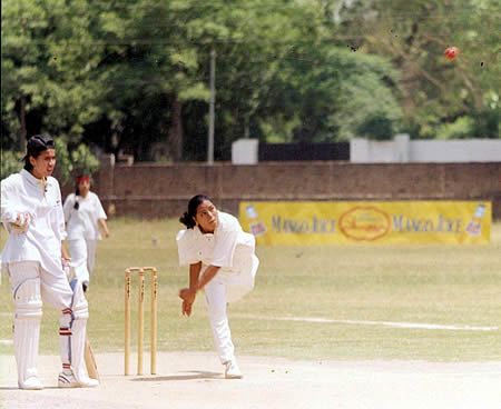 Raeesa Ilyas, left arm spinner in bowling action during a match