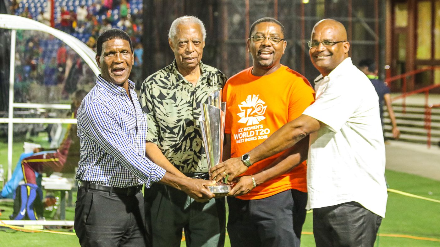 Lawrence Rowe, Lance Gibbs, CWI president Dave Cameron and vice-president Emmanuel Nanthan show off the Women's World T20 trophy