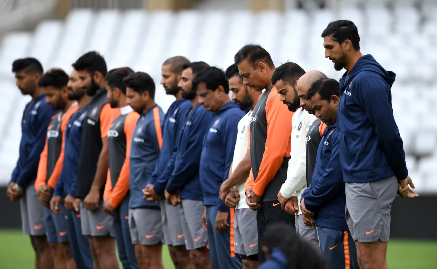 Members of the Indian team on tour in England observe a minute's silence in memory of Ajit Wadekar before their training session