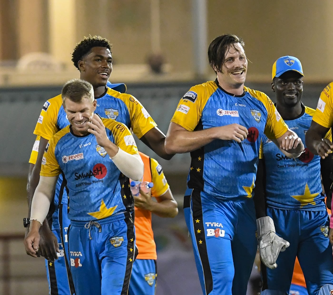 David Warner, Obed McCoy, Andre Fletcher and Mitchell McClenaghan celebrate a win