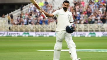 Who has top-scored more often in Tests - Kohli or Root?