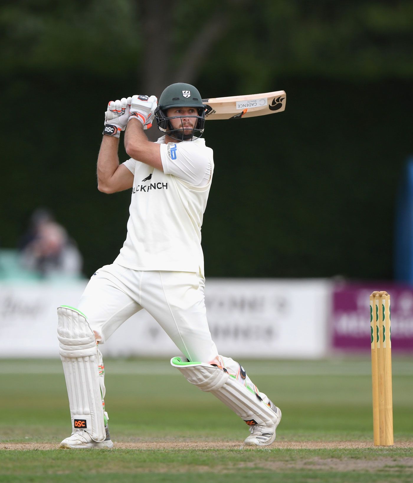 Ross Whiteley cuts during his half-century