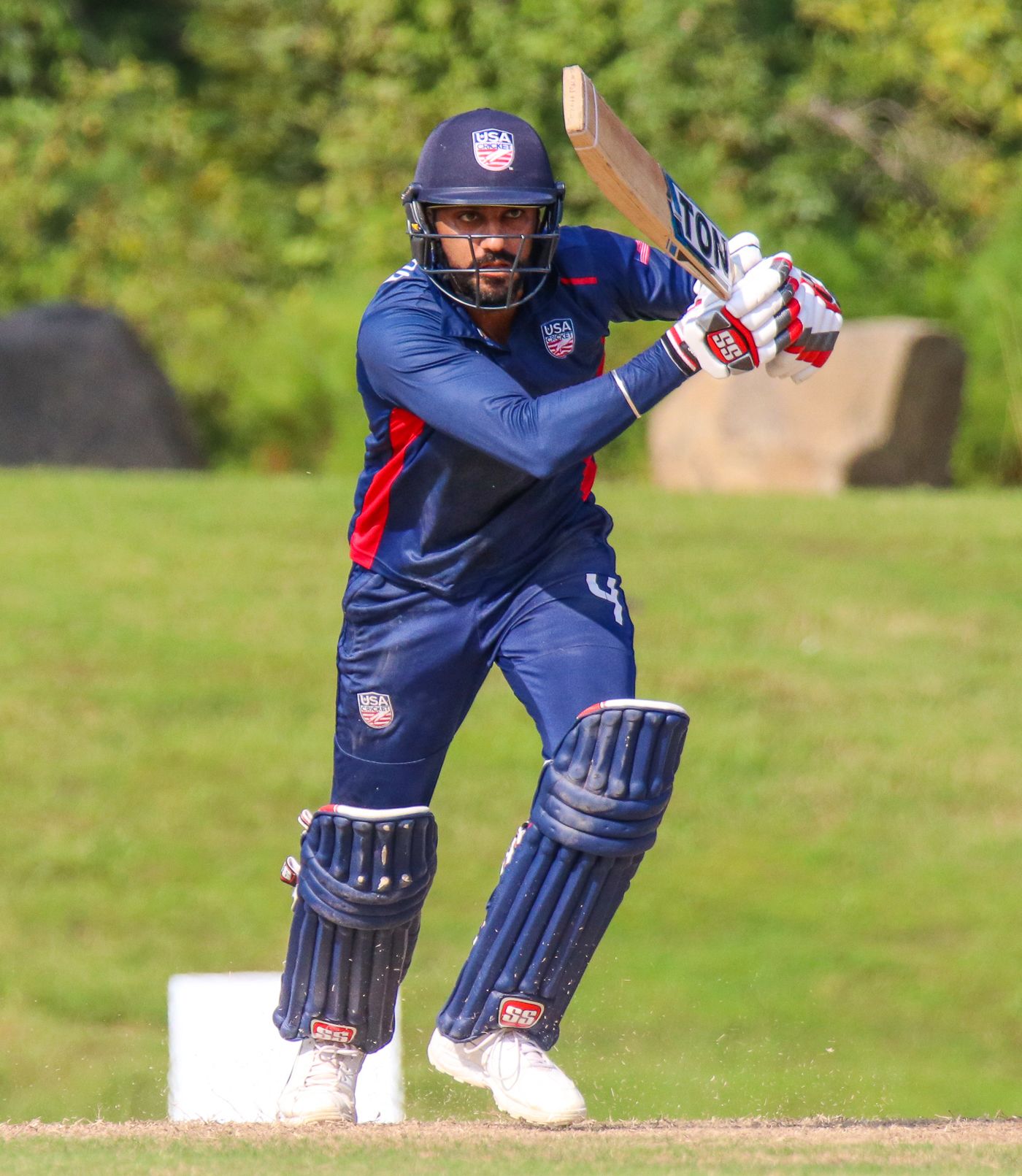 Jaskaran Malhotra drives down the ground
