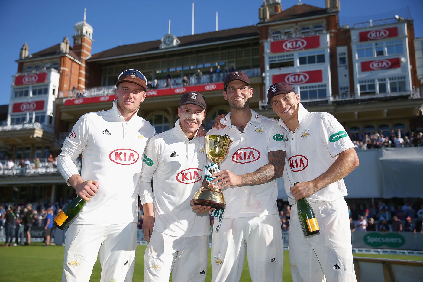 Jason Roy, Rory Burns, Jade Dernbach and Tom Curran pose in front of the pavilion