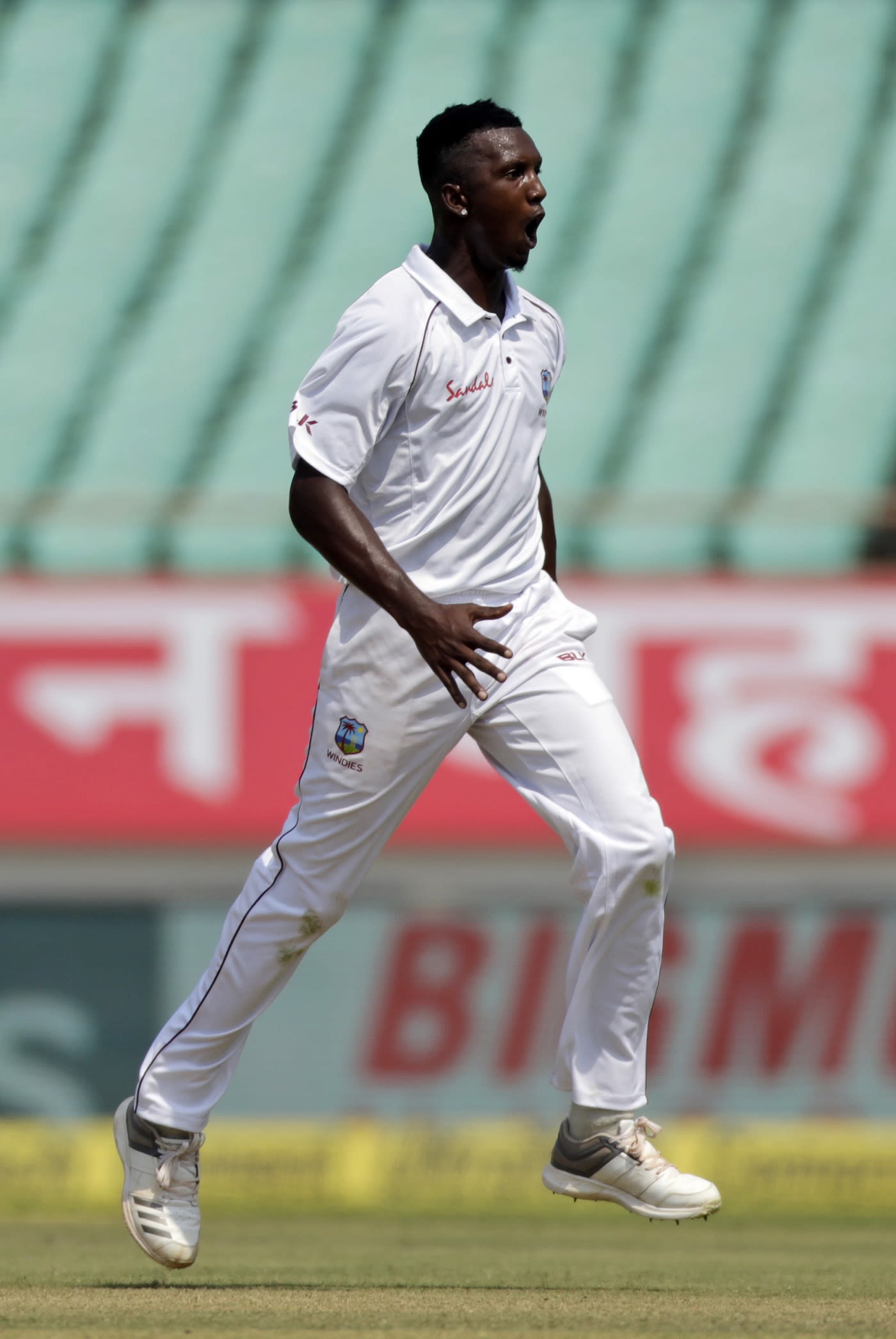 Sherman Lewis celebrates after getting Cheteshwar Pujara for his maiden Test wicket