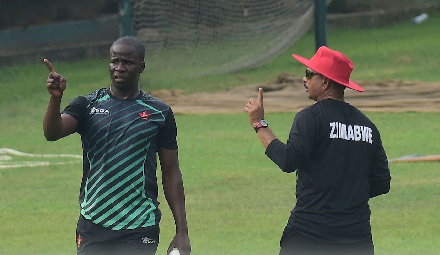 Donald Tiripano and Zimbabwe coach Lalchand Rajput at training
