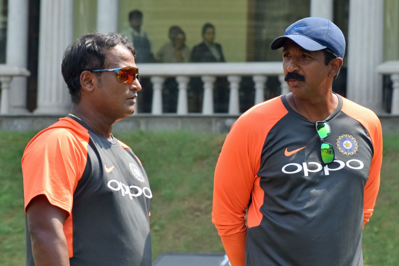 India head coach Ramesh Powar and fielding coach Biju George have a chat