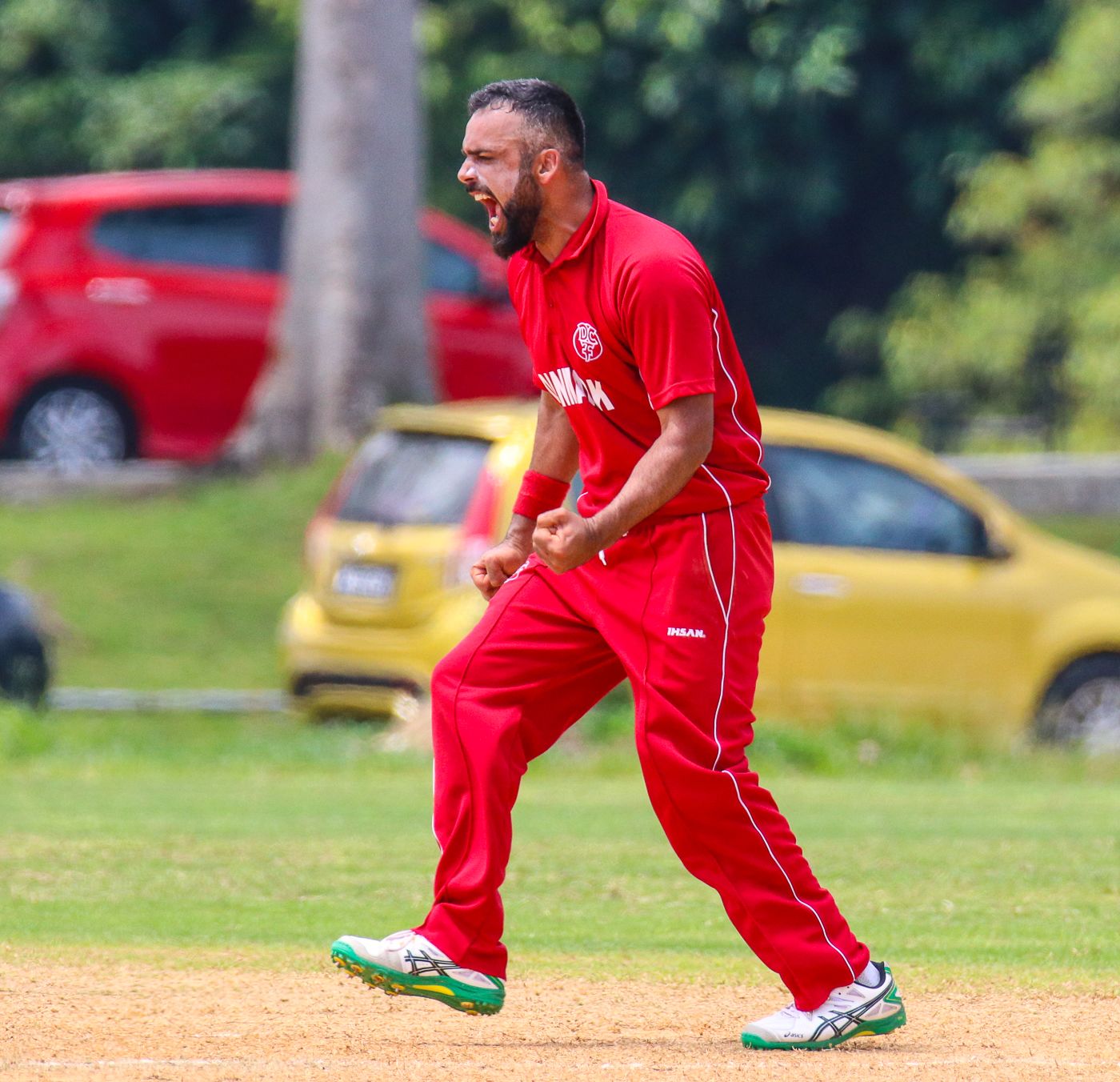 Bashir Shah roars in delight after claiming a wicket