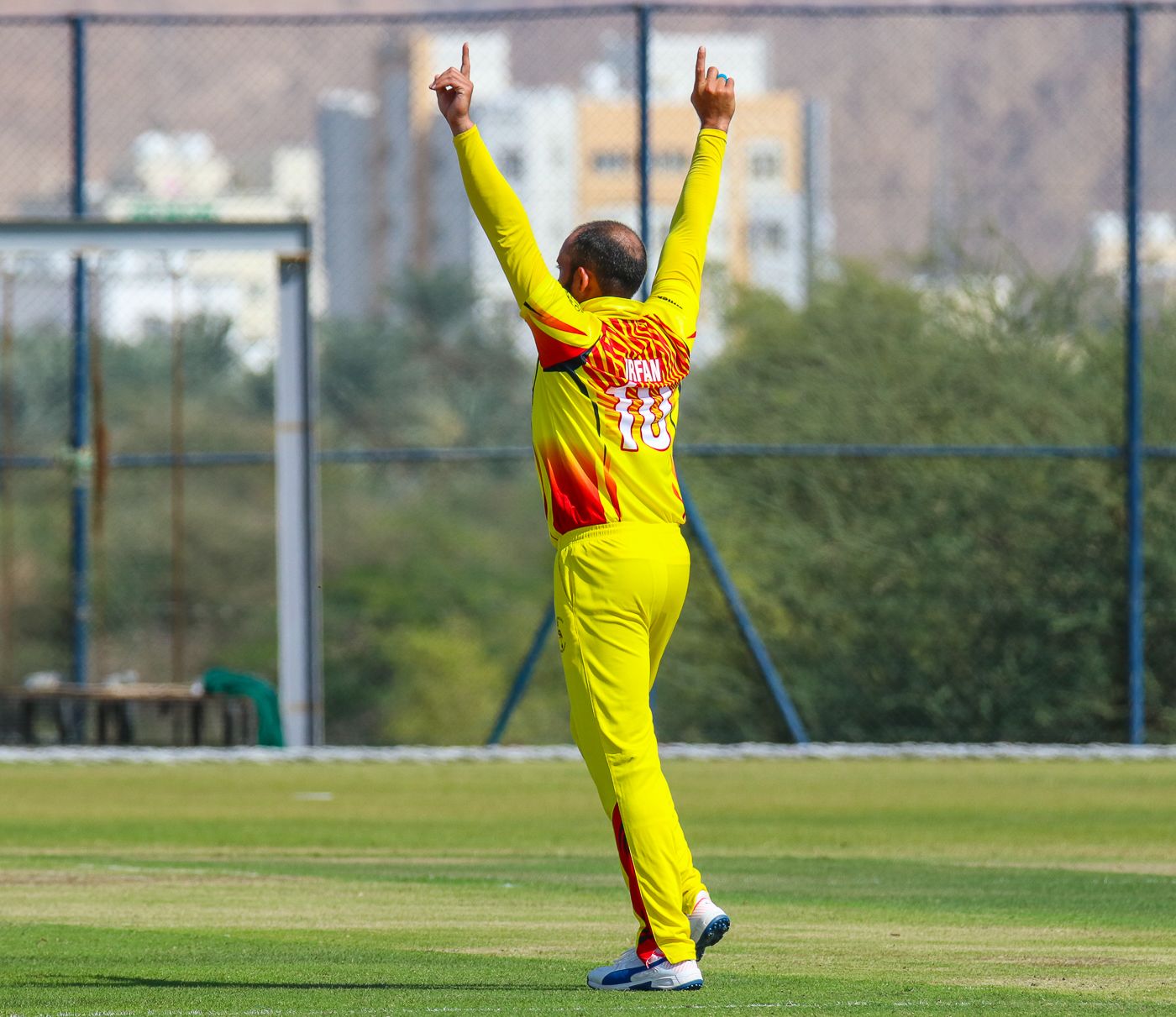 Irfan Afridi breaks out the Starfish celebration pose after another wicket