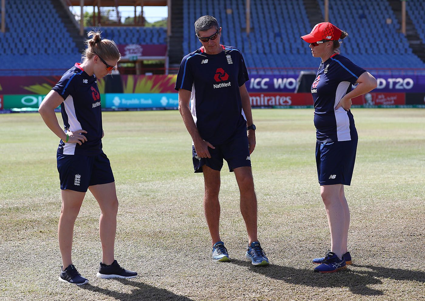 Heather Knight, Mark Robinson and Anya Shrubsole inspect the outfield
