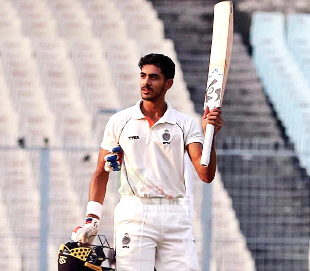 Aryaman Birla celebrates after getting to his maiden century