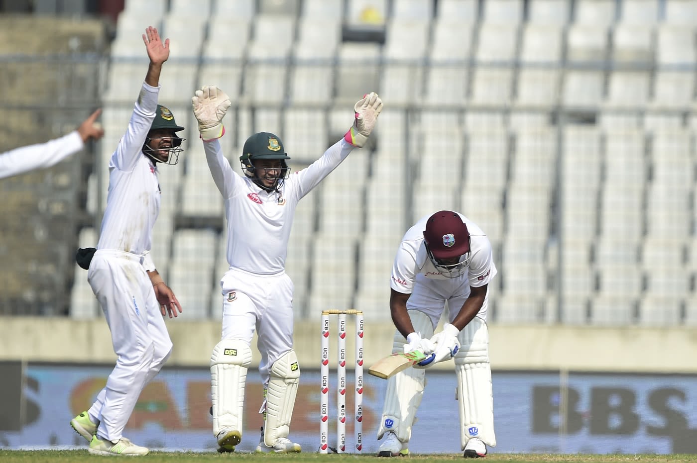 Bangladesh's players successfully appeal for an lbw against Sunil Ambris