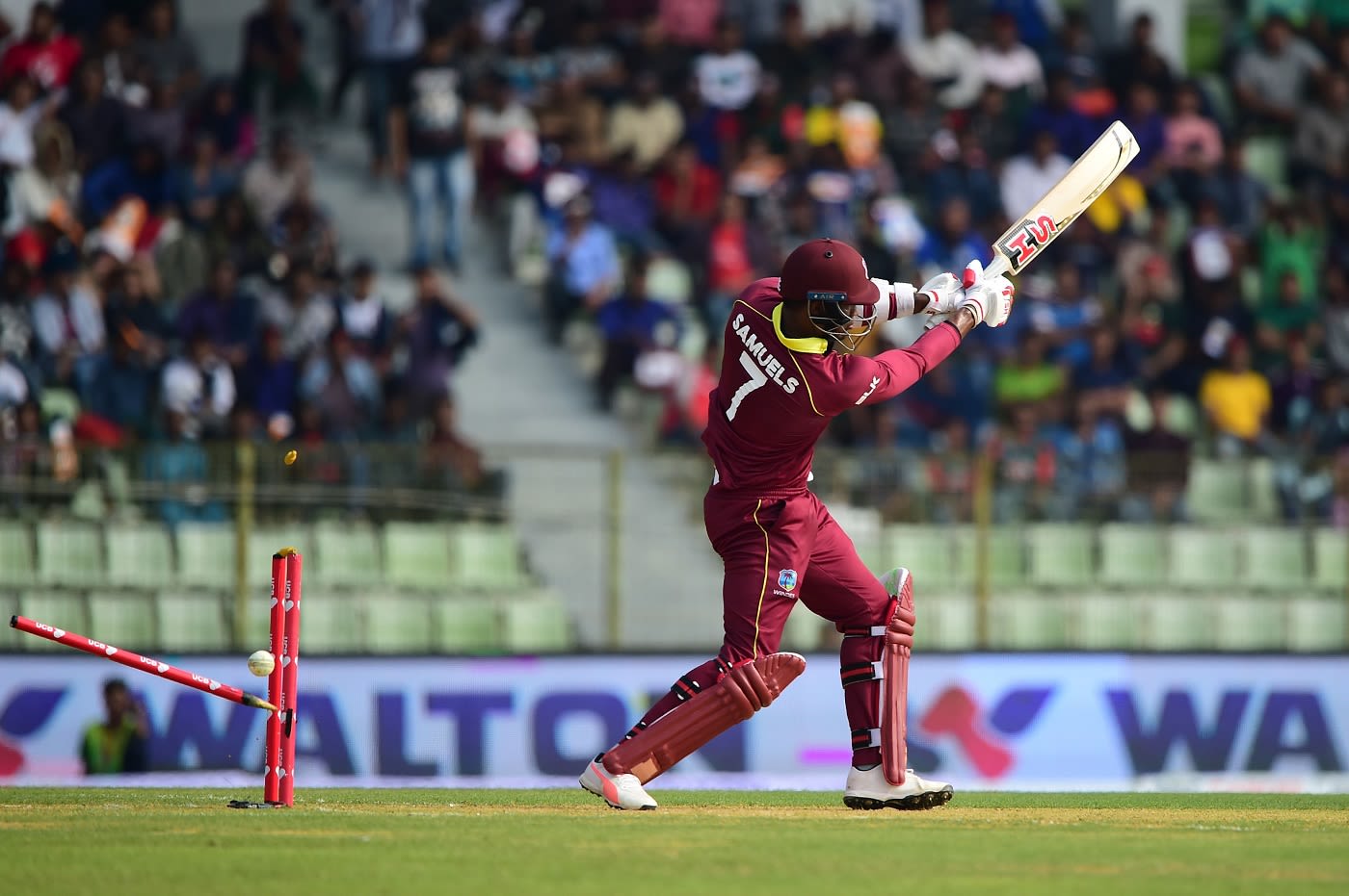 Marlon Samuels gets bowled