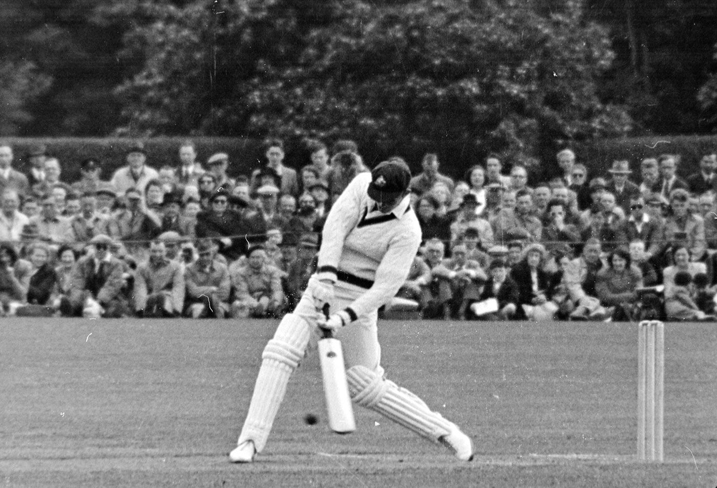 Ernie Toshack looks to hit a six