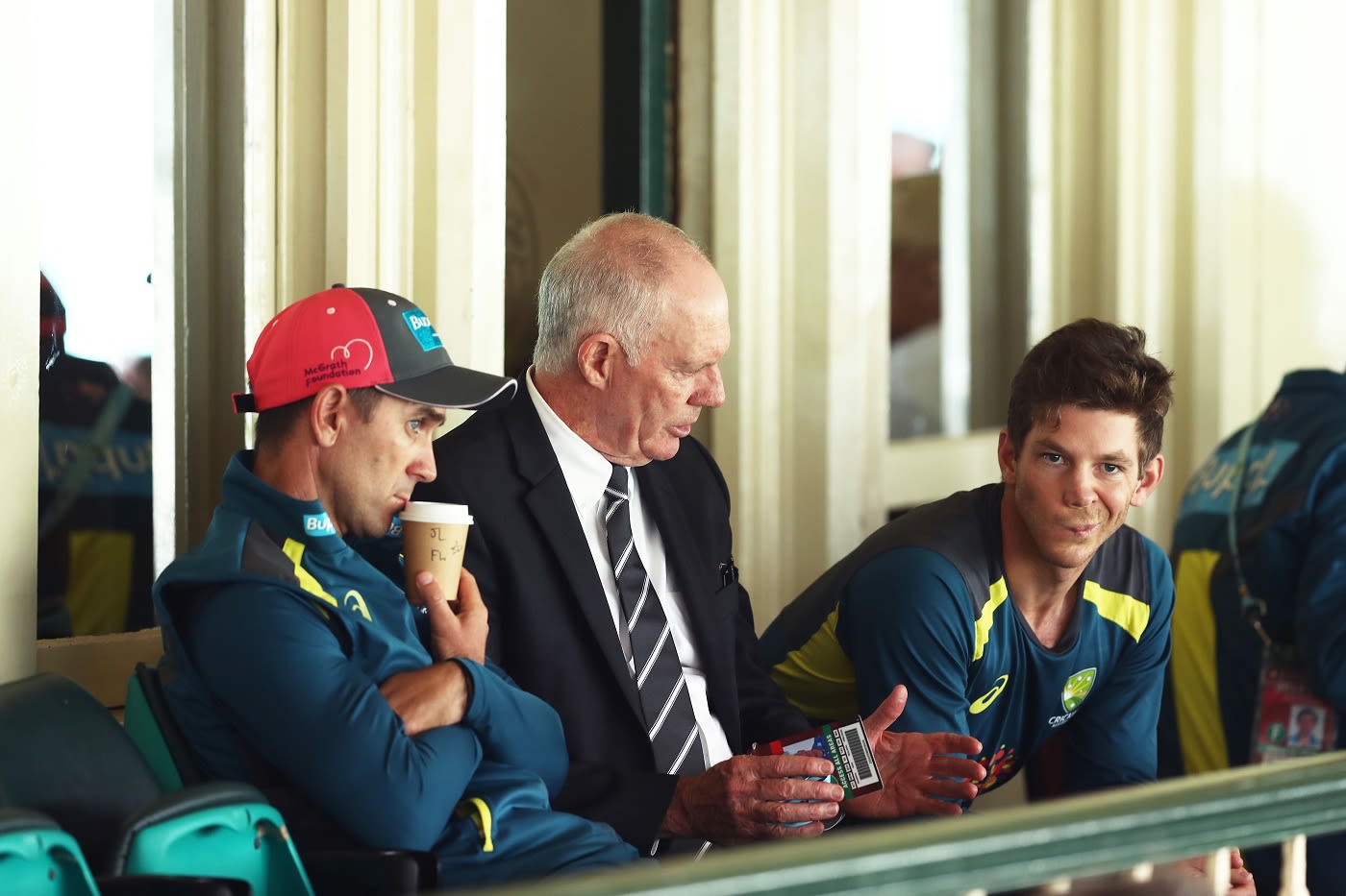 Greg Chappell talks to coach Justin Langer and captain Tim Paine