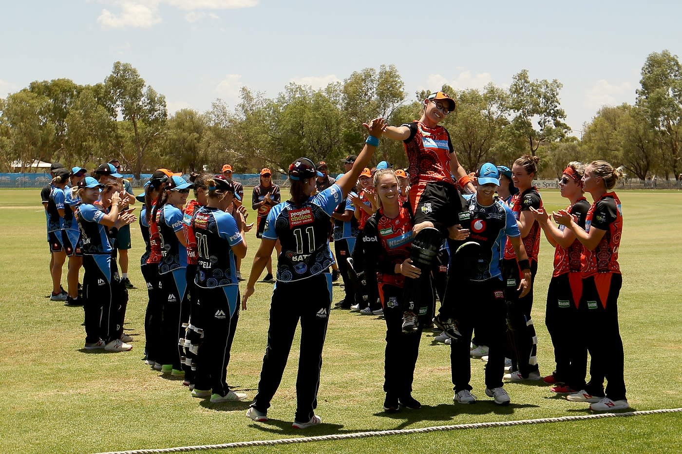 Lauren Ebsary is carried off the field after her last game