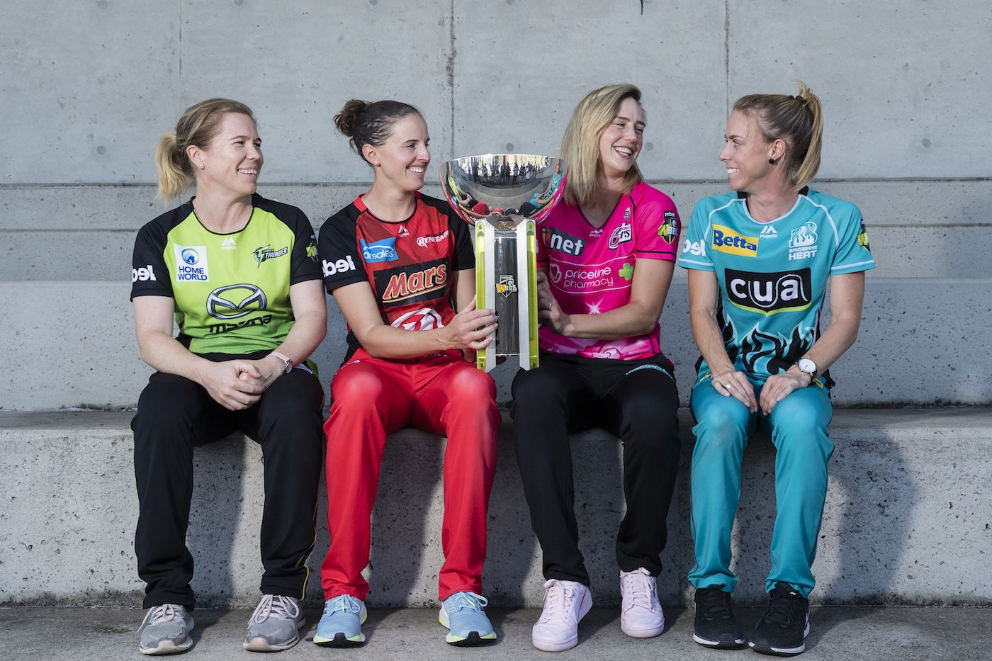 Alex Blackwell, Amy Satterthwaite, Ellyse Perry and Kirby Short with the WBBL trophy 