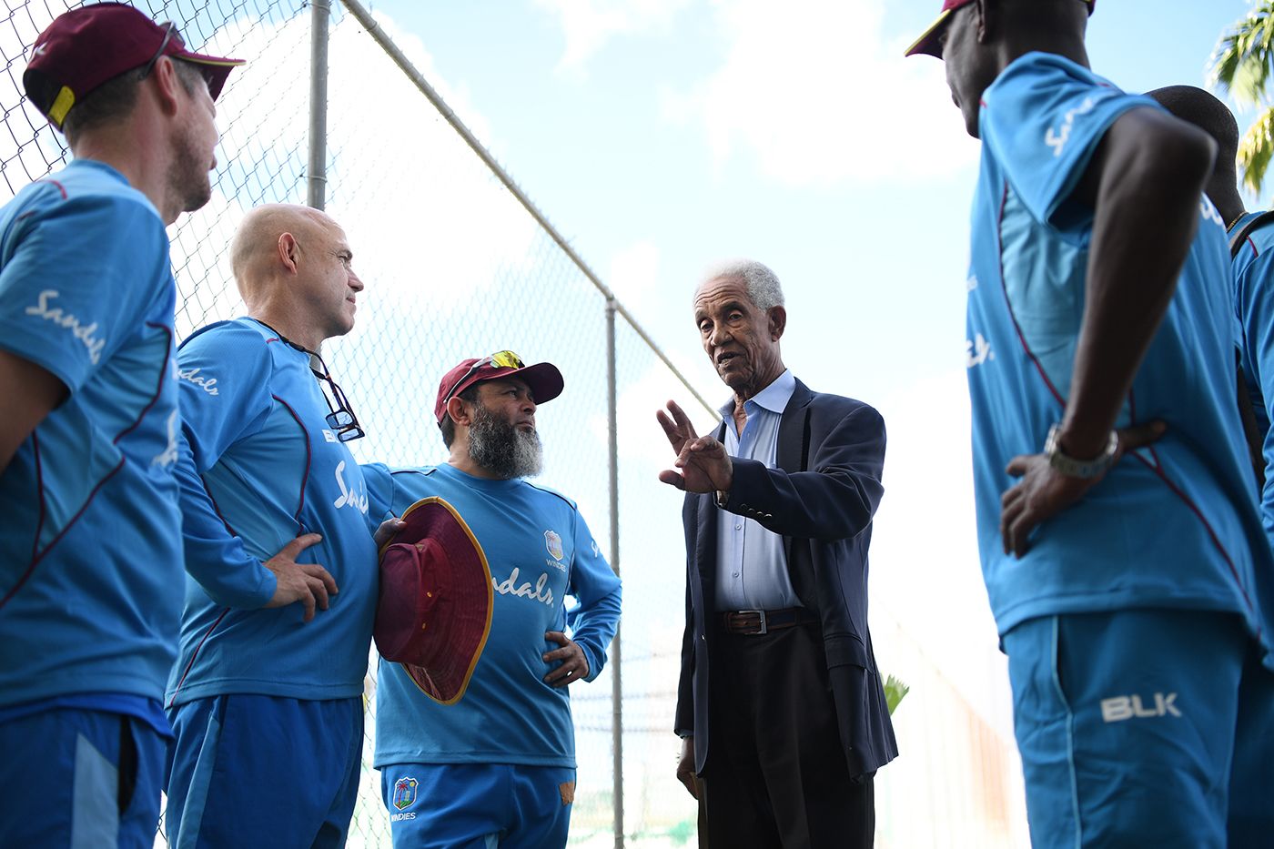 Sir Garfield Sobers demonstrates his wrist position to West Indies' coaching staff