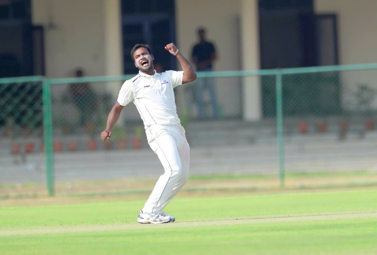 Tanveer ul-Haq celebrates a wicket