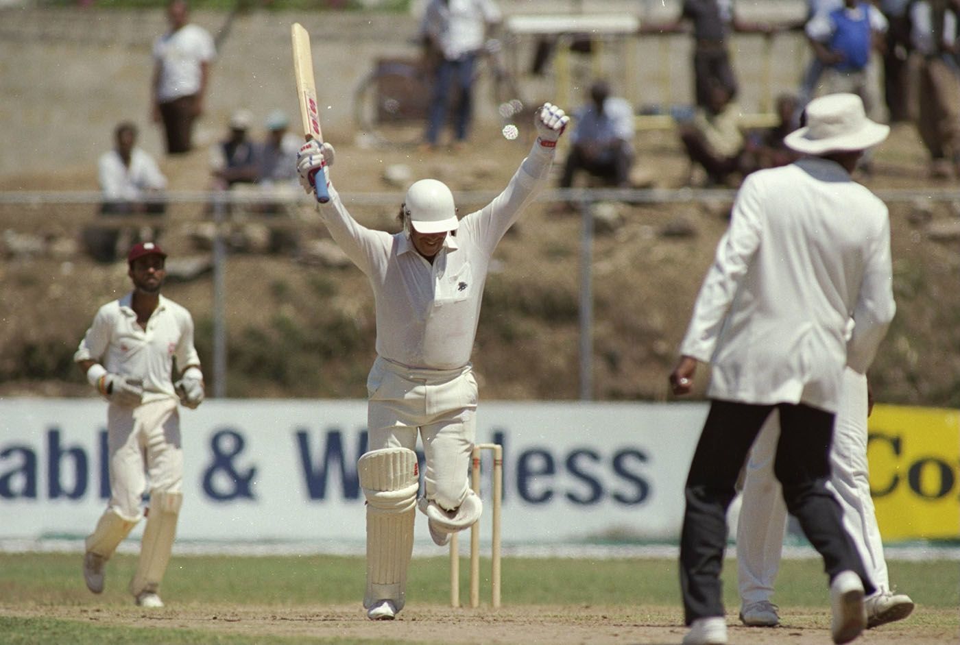 Wayne Larkins of England celebrates the winning run during the 1st Test match in Jamaica.