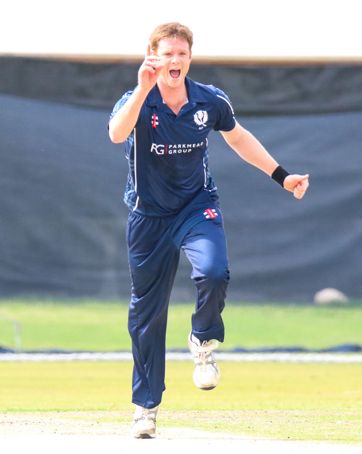 Alasdair Evans goes up with a successful appeal for caught behind