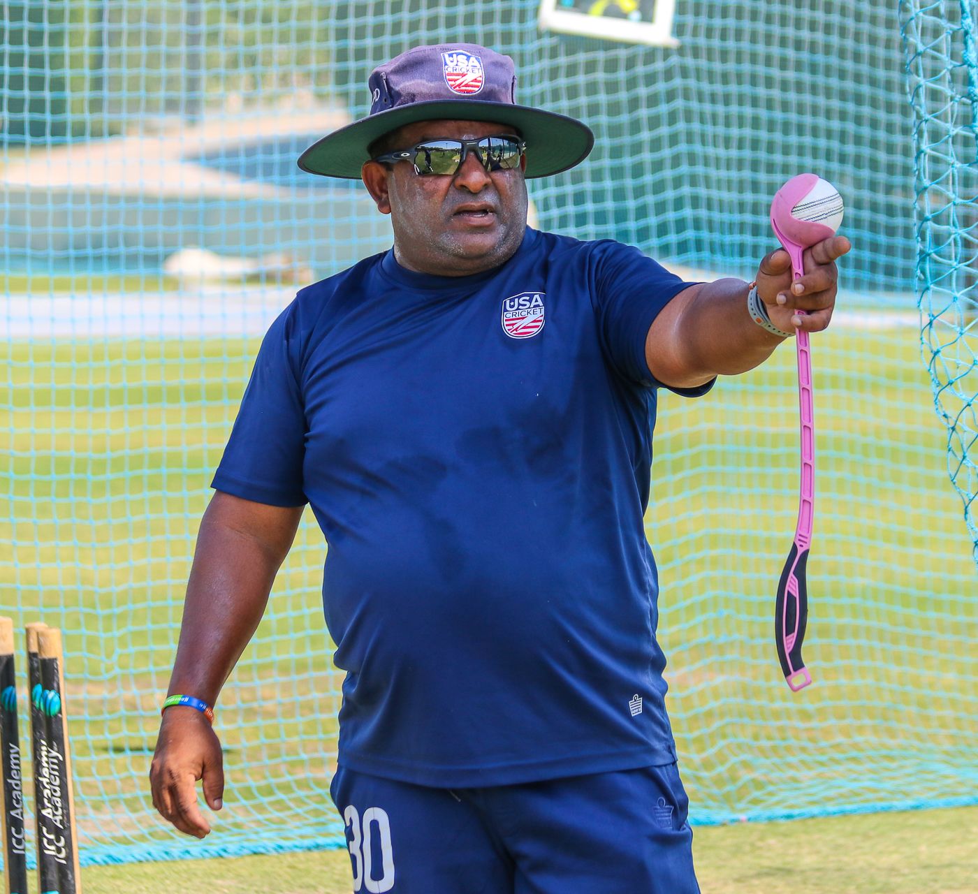 USA coach Pubudu Dassanayake gets things in motion during training