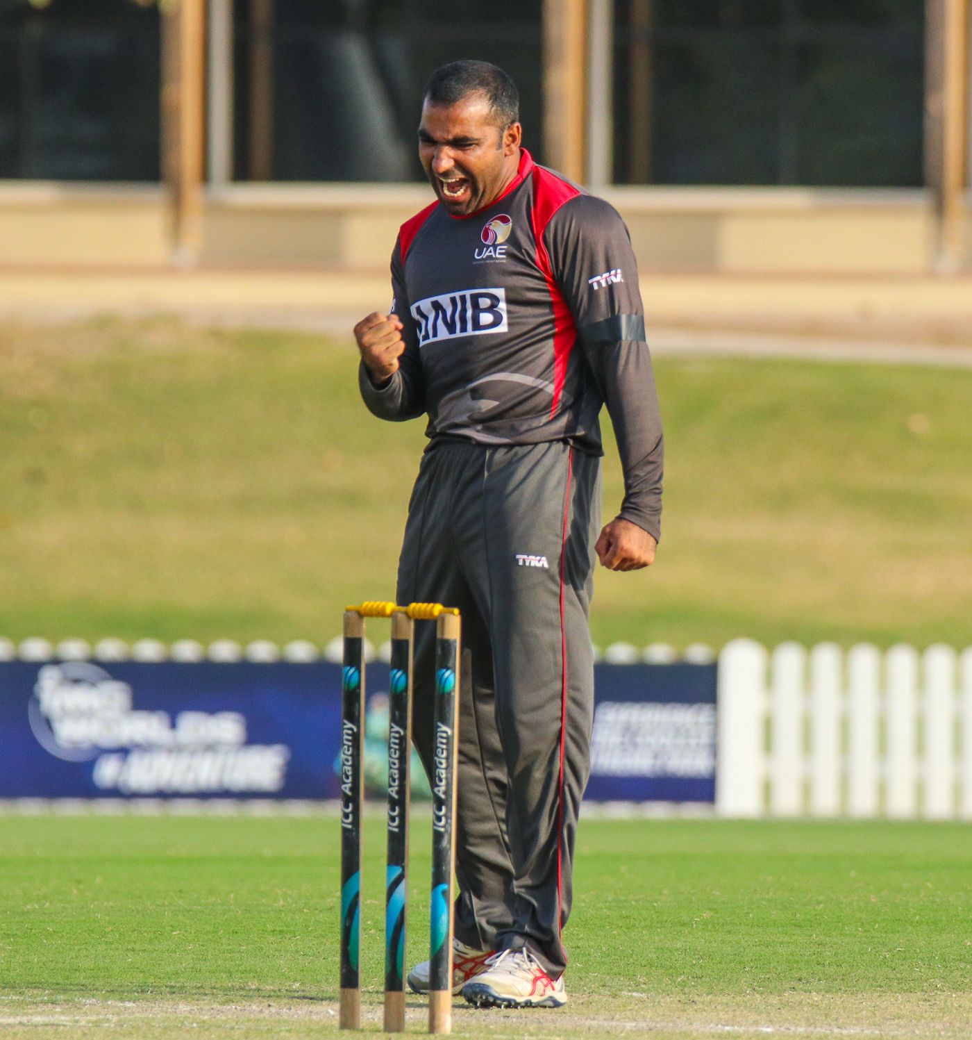 Sultan Ahmed pumps his fist after taking a big wicket