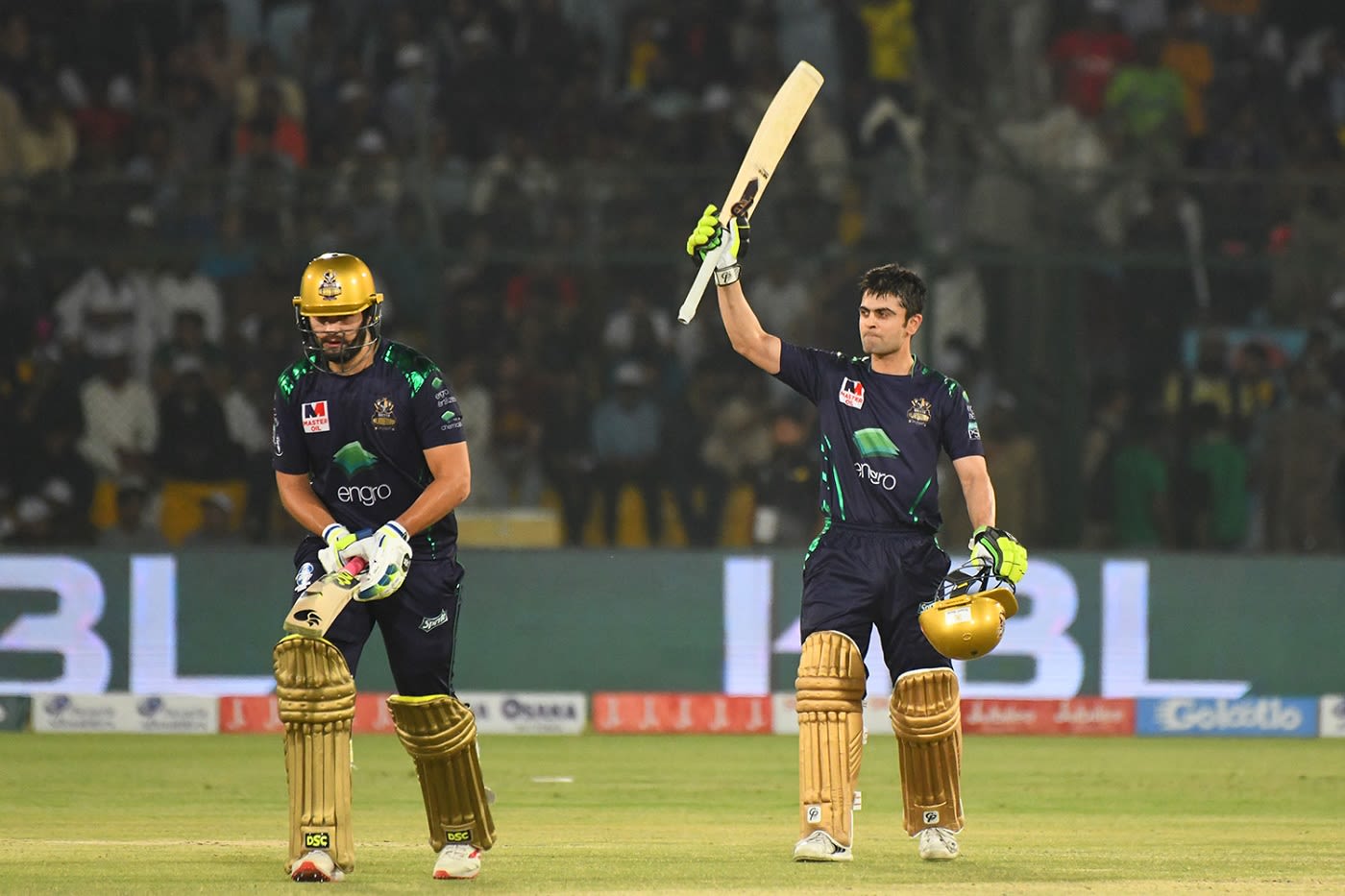 Rilee Rossouw and Ahmed Shehzad walk off the field after winning PSL 2019 