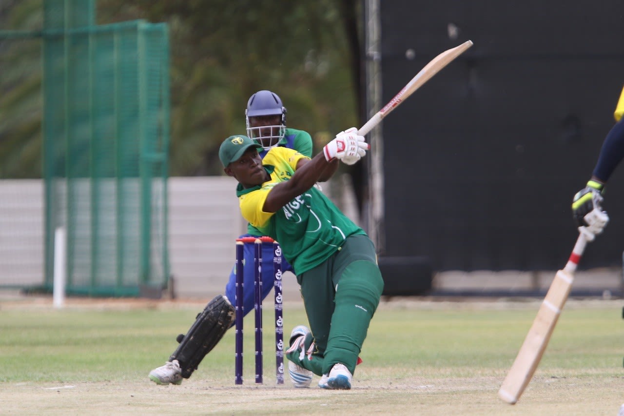 Peter Aho smashes one to midwicket