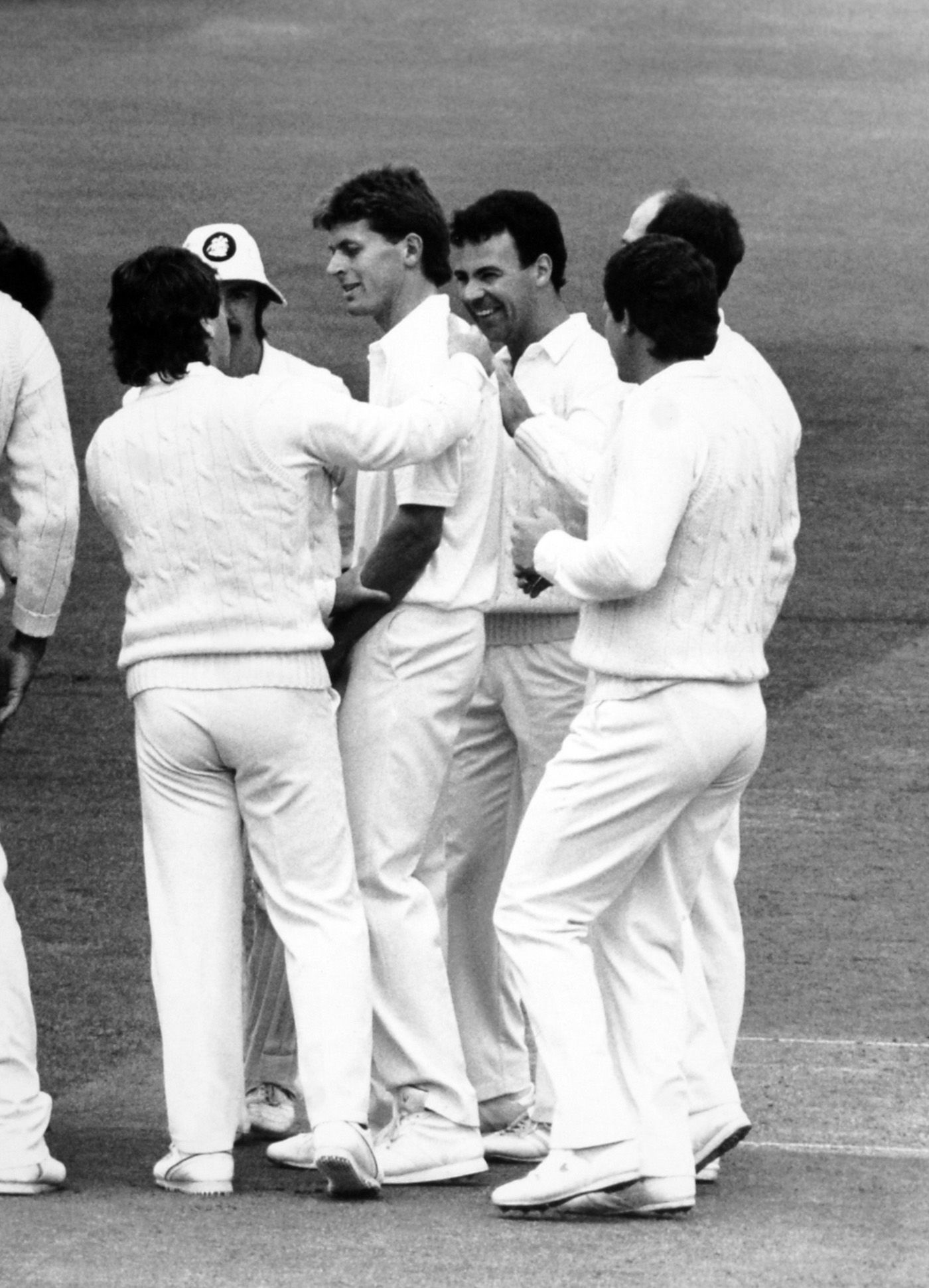 Phil Newport gets a pat on the back after a dismissal