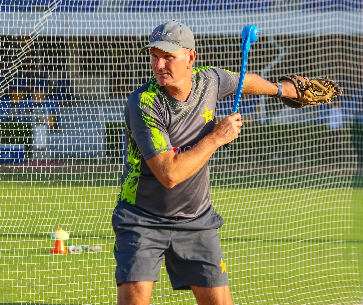 Fielding coach Grant Bradburn fires some throwdowns during a Pakistan training session