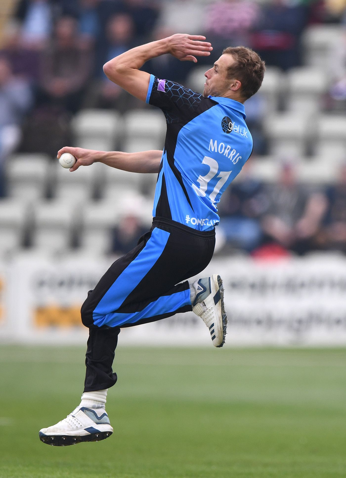 Chris Morris arrives at the bowling crease