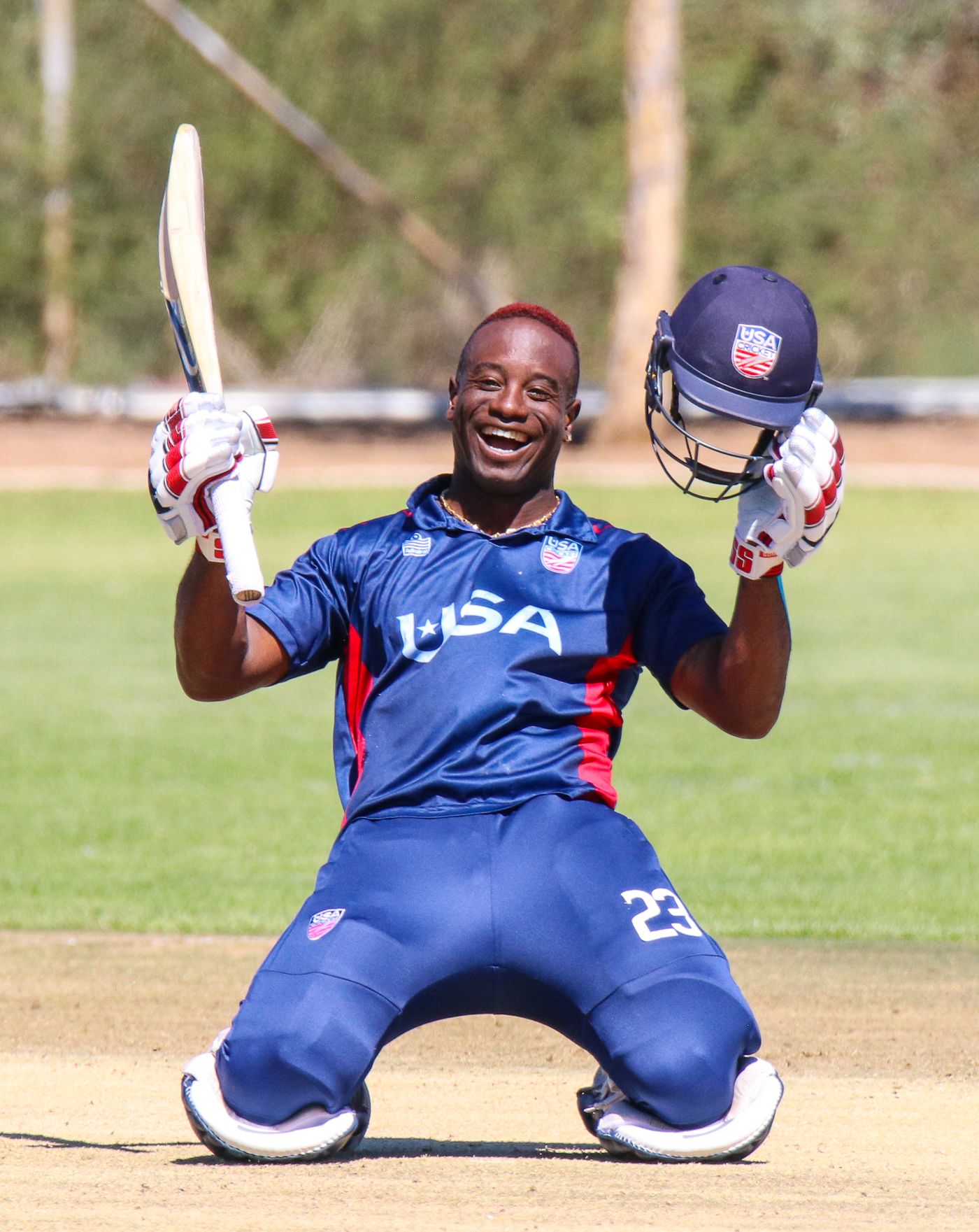 Xavier Marshall grins from ear to ear celebrating his century in style