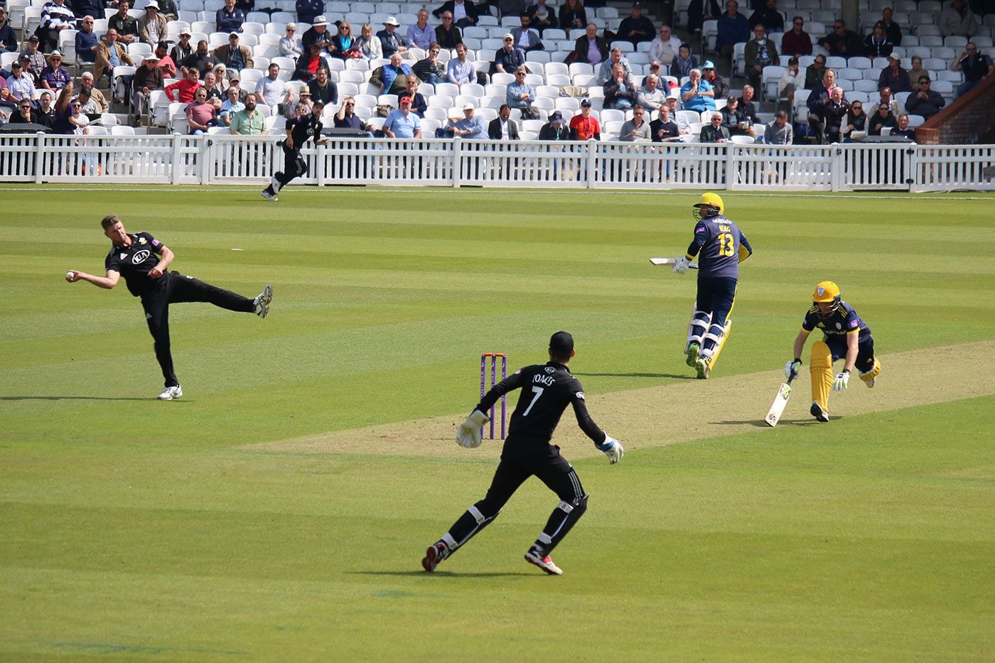 Stuart Meaker shies as Liam Dawson dives for his crease