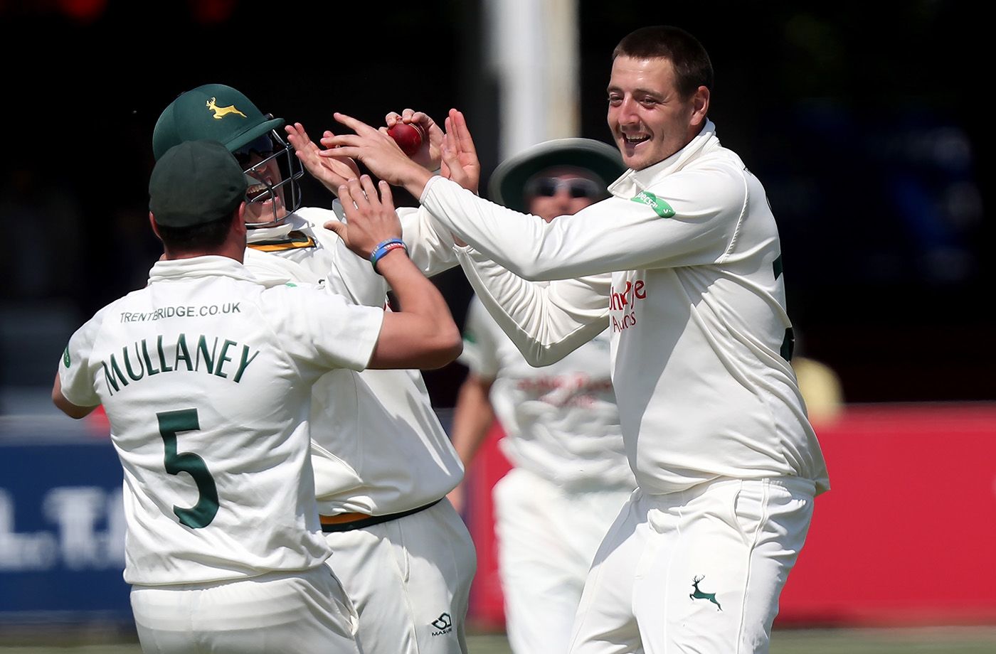 Matthew Carter celebrates with his team-mates