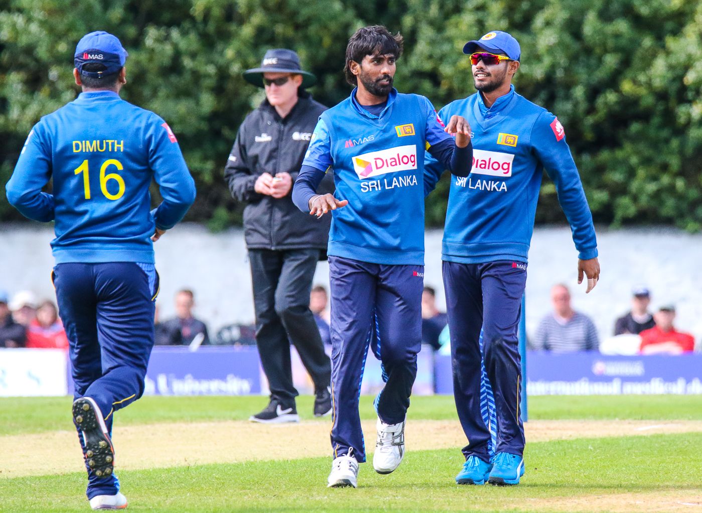 Nuwan Pradeep celebrates after taking his second wicket of the day