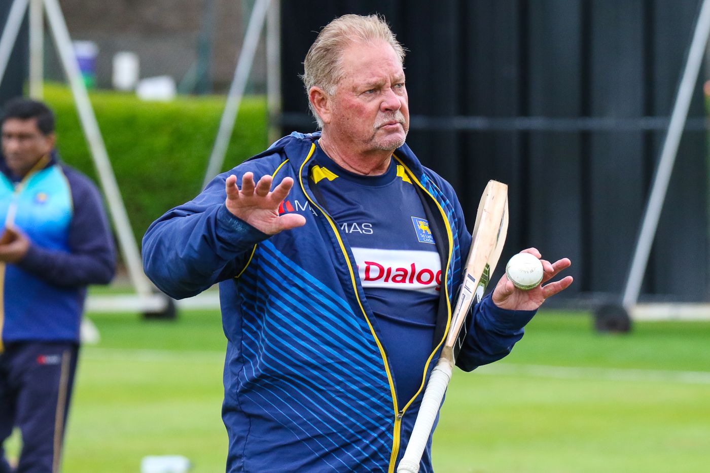 Fielding coach Steve Rixon prepares for a drill during a training session