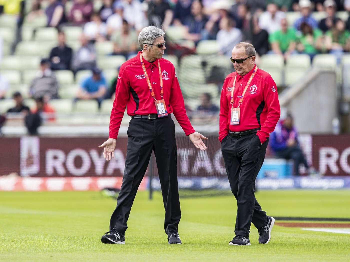 Umpires Nigel Llong and Ian Gould make a pitch inspection