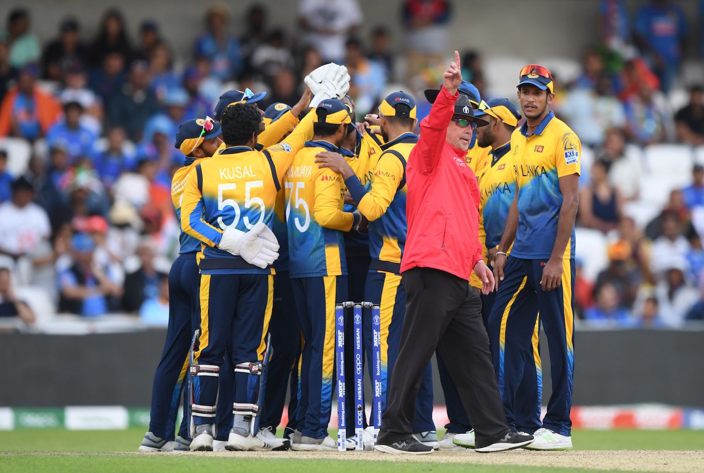 Umpire Ian Gould raises his finger one final time