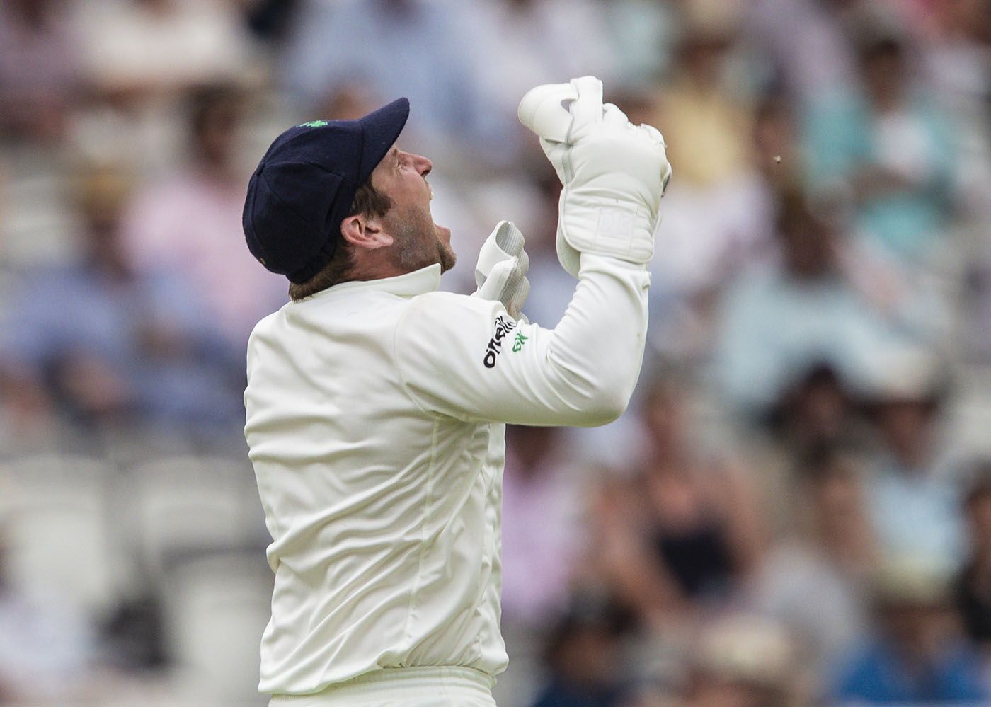 Gary Wilson celebrates after catching Moeen Ali